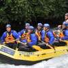 Cena di gruppo con pizza e domenica mattina di libertà con il rafting sul fiume